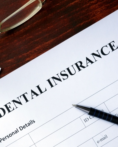 Dental insurance form on desk