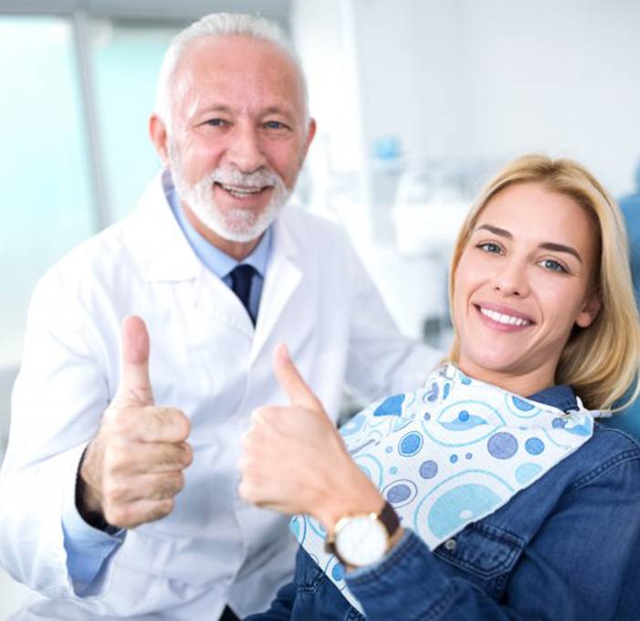 a patient speaking with her dentist about a dental plan