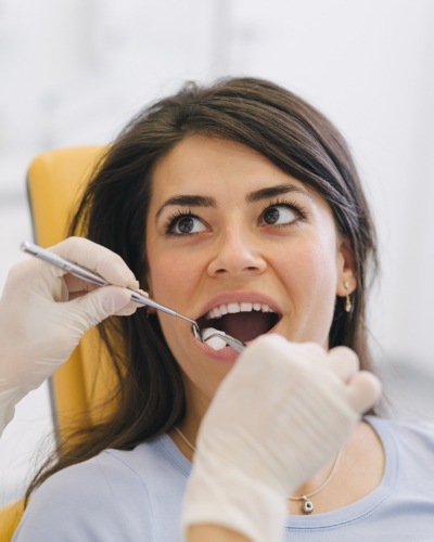 Woman receiving a dental checkup